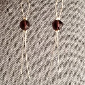 Dark red dangle earrings